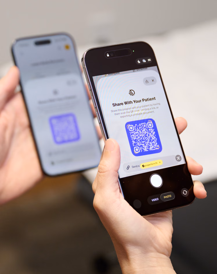 Phone showing a QR code to share a program