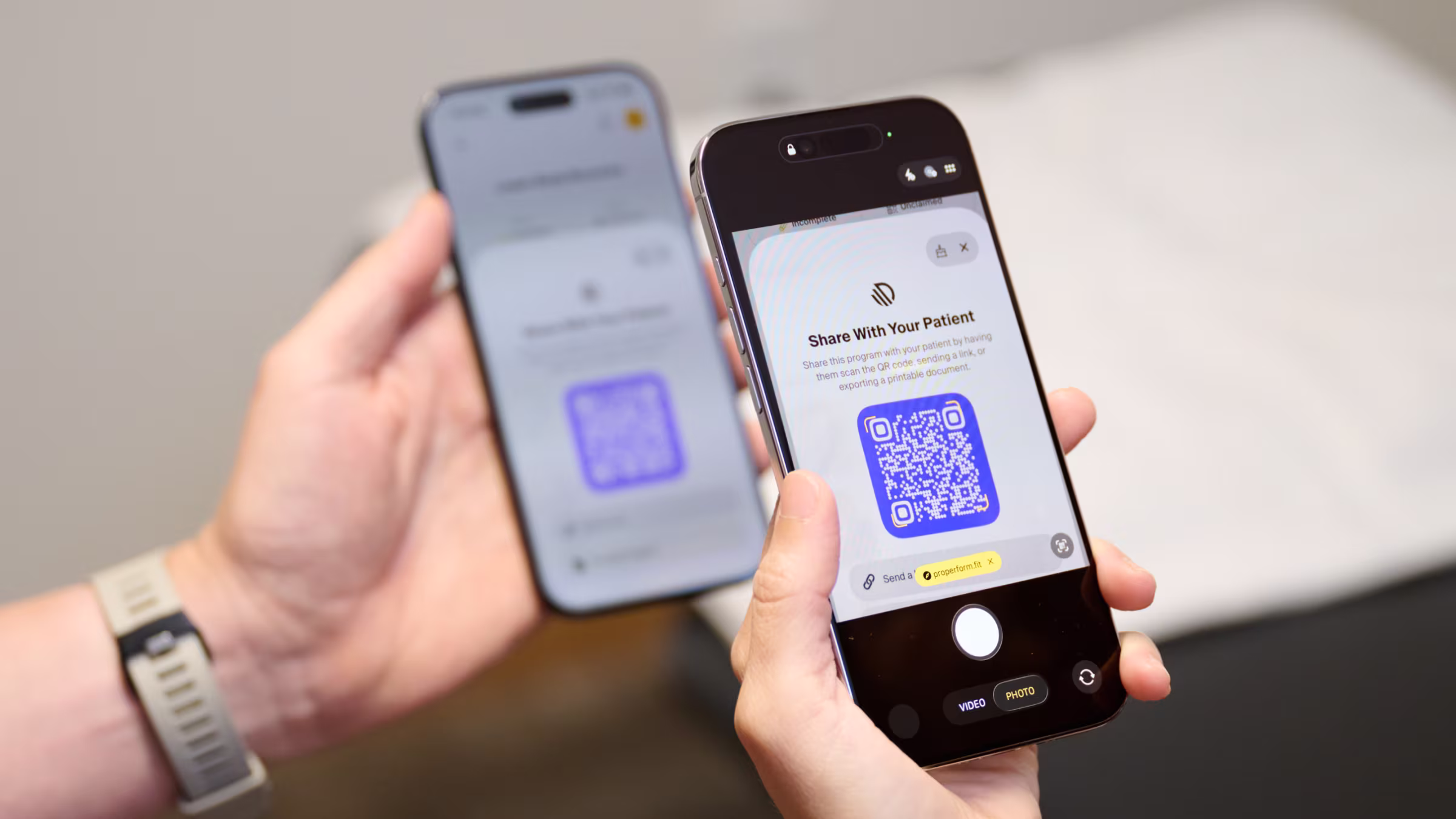Patient scanning a QR code to receive their home exercise program